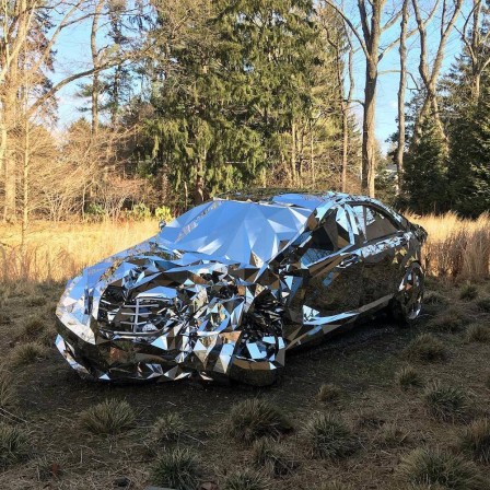A_Wrecked_Luxury_Car_Built_From_Over_12000_Reflective_Steel_Parts_Mercedes.jpg