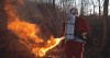 pere_noel_lance_flamme_calendrier_des_pompiers.gif
