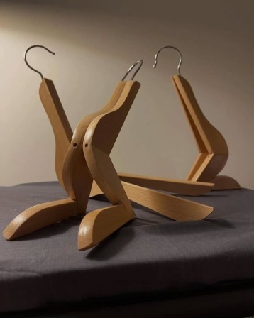 Victor Kammeijer (Dutch) @studiokammeijer &amp;quot;Hook me up&quot; (2025) Assemblage, made of six wooden clothes hangers cintre trouples l'amour à trois mode d'emploi