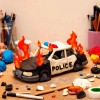voiture de police en feu les enfants jouaient aux émeutes en banlieue.gif, déc. 2023