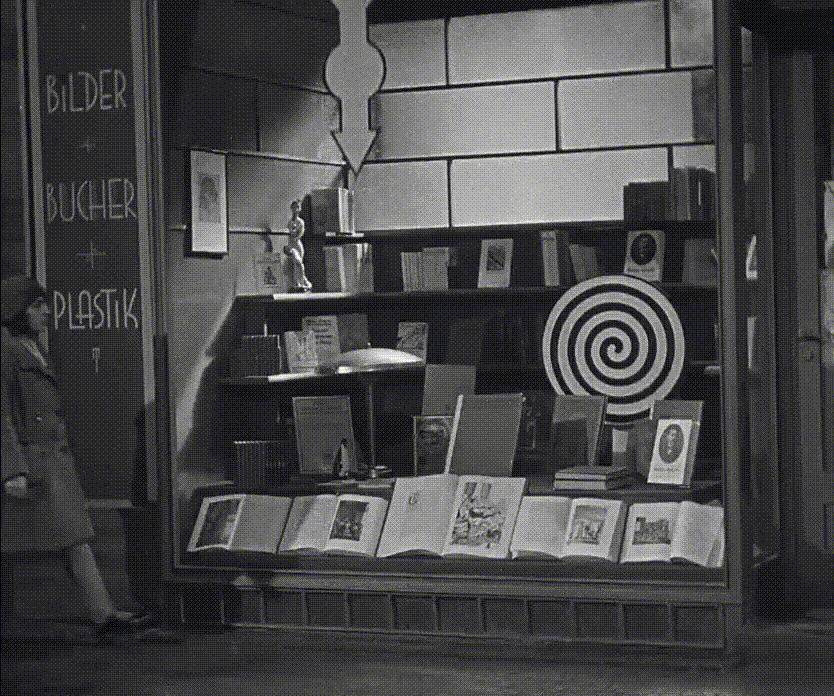 M Fritz Lang 1931 les livres dans la vitrine le commerce de proximité.gif, nov. 2021