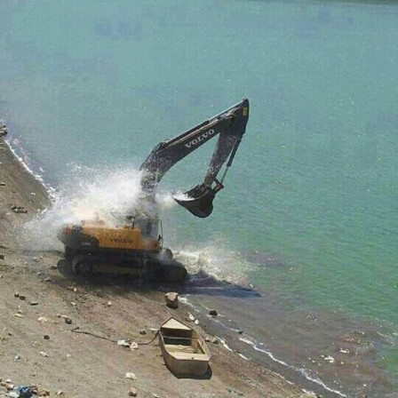 plage_pelleteuse_chaleur_douche.jpg