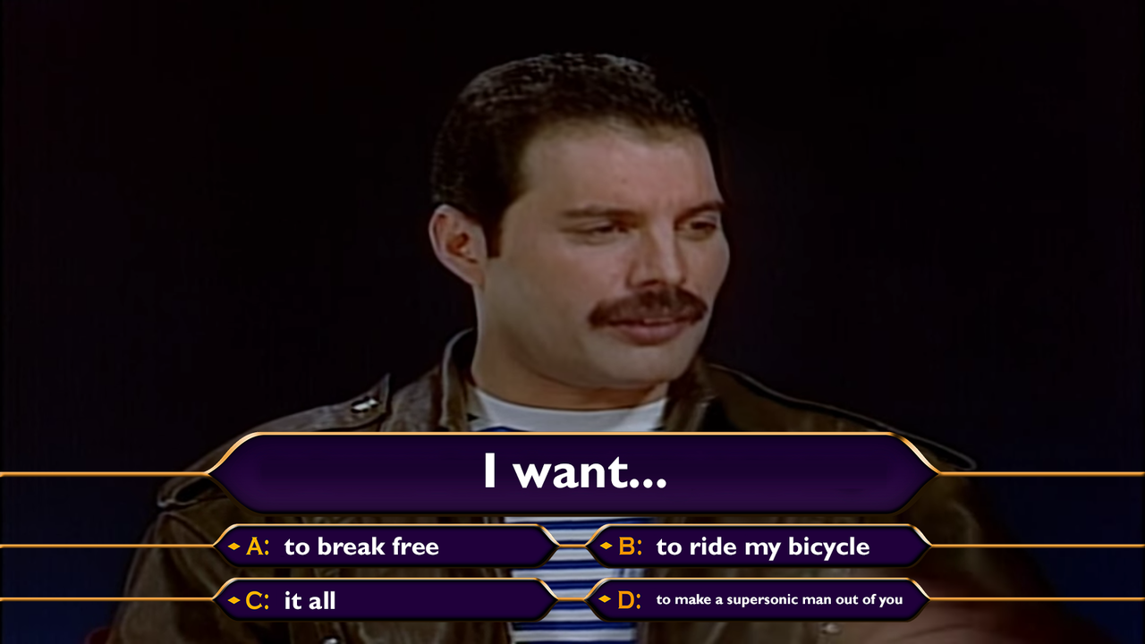 [LE TOPIC A LA CON] le dernier qui poste... poste - Page 21 Freddie_Mercury_appearing_on_the_UK_version_of_Who_Wants_To_Be_A_Millionaire_Circa_1989