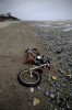 A_Harley-Davidson_motorbike_lies_on_a_beach_in_Graham_Island.jpg