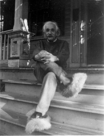 Albert Einstein sitting on the front steps of his Princeton home while wearing his fuzzy slippers.jpg