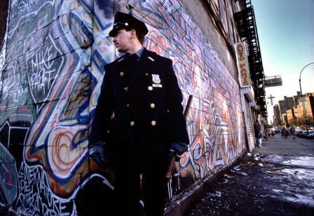Joseph_Rodriguez_Policeman_on_duty_Spanish_Harlem_1987.jpg