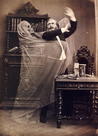 Double-exposed photograph of French illusionist Henri Robin with a ghost⁣   Photo  Eugène Thiébault 1863⁣.jpg, mar. 2021