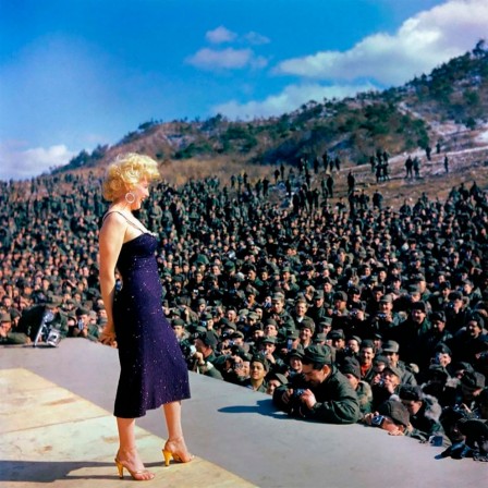 Marilyn Monroe singing to an audience of G.I.’s during the first show of her recent four-day tour of Korea on February 22, 1954.jpg, sept. 2020