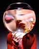 Elegant Encounters Vogue Italia’s January 2021 Animal Issue through the lens of Carlijn Jacobs verre de poisson la femme dans le bocal derniers poissons d'avril